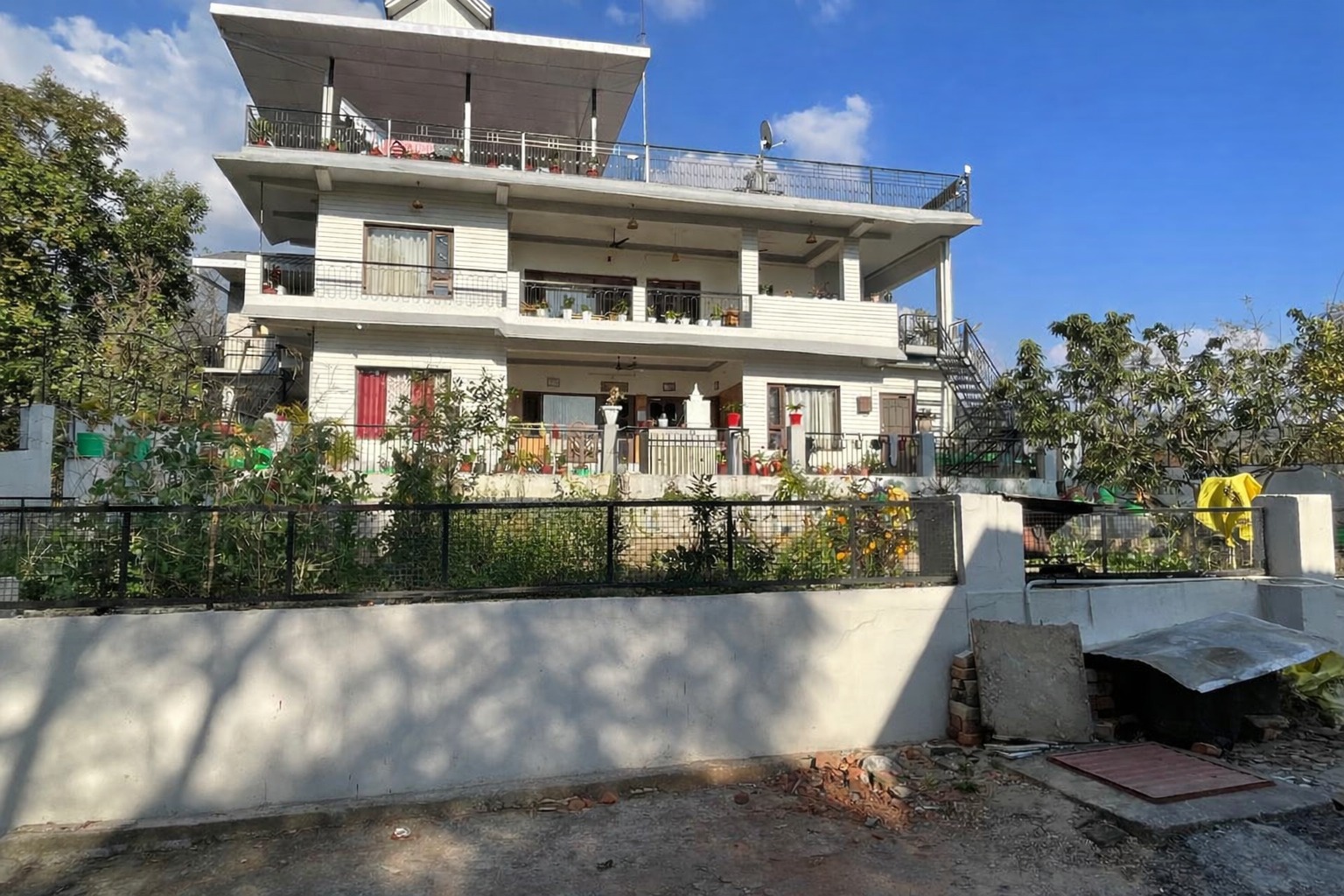 Homestead exterior at dusk